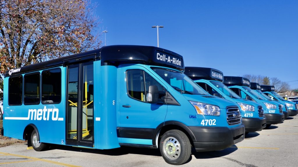 New Metro blue Call‑A‑Ride vans shown lined up side by side